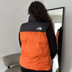 CHALECO TNF UNISEX ORANGE - Elixir Indumentaria