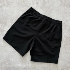 MALLA POLO BOLSILLO CON CIERRE NEGRA - comprar online