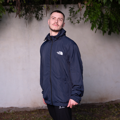 ROMPEVIENTO TNF IMPORTADO AZUL MARINO