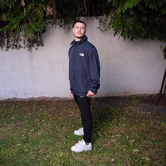 ROMPEVIENTO TNF IMPORTADO AZUL MARINO - comprar online