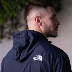 ROMPEVIENTO TNF IMPORTADO AZUL MARINO en internet