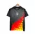 camisa-alemanha-pre-jogo-24-25-torcedor-adidas-masculina-preta