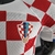 camisa-selecao-da-croacia-home-22-23-jogador-nike-masculina-vermelho-e-branco