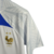 camisa-selecao-da-franca-treino-22-23-torcedor-nike-masculina-branca-com-detalhes-em-azul-e-dourado