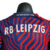 camisa-rb-leipzig-ii-23-24-jogador-nike-masculina-vermelha-com-detalhes-em-azul-e-branco