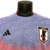 camisa-japao-ii-23-24-jogador-adidas-masculina-rosa-com-detalhes-em-azul-e-preto