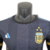 camisa-argentina-edicao-especial-23-24-jogador-adidas-masculina-preta-com-detalhes-em-azul-e-branco-e-dourado