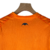 kit-infantil-valencia-iii-puma-23-24-laranja-com-detalhes-em-azul