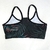TOP NEGRO CON HOJAS EN COLOR SALMON CON VERDE - comprar online