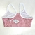 TOP ROSA CON FLORES BLANCAS