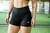 SHORT NEGRO ANIMAL PRINT CON FRUNCE