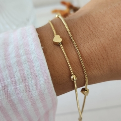 PULSERA DOBLE CORAZÒN Y BOLITAS - comprar online