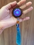 chaveiro de mandala azul brilha no escuro