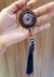 Chaveiro de mandala azul escuro brilha no escuro