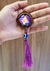 Chaveiro de universo roxo brilha no escuro