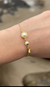 Pulseira grão de areia na internet
