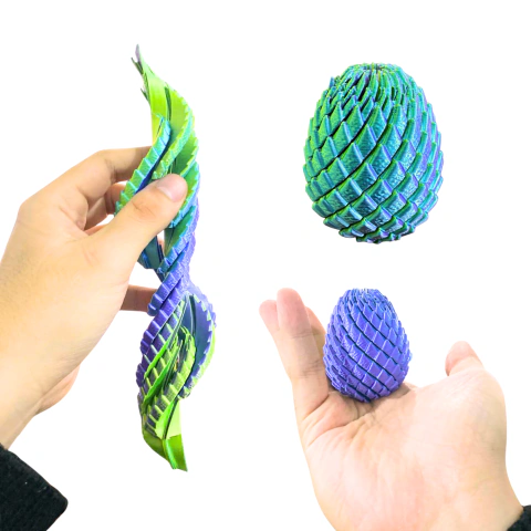 Imagen de Huevo de Dragón Telescópico Mágico (Fidget Toy Antiestrés) - Multicolor Iridiscente