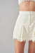 Shorts Saia Fiore Off White na internet