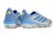Chuteira campo Adidas Copa Pure 3 Elite na cor prateada com detalhes em azul e verde, vista lateral.