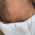Colar longo ouro com medalhinhas ovais