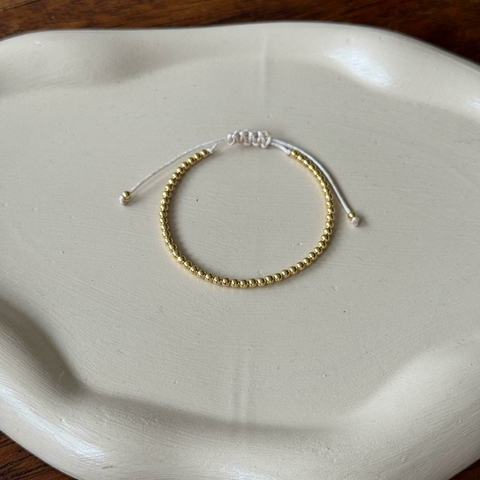 Pulseira ajustável mini esferas ouro