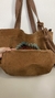 Bolsa Marrom Luz Camila na internet