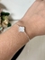 Pulseira trevo em madrepérola na internet