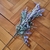 Flor artificial roxa com bolinhas