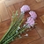 Flor artificial bolinhas rosa