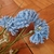 Flor artificial bolinhas azul - comprar online