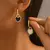 Pendientes de candado de amor de dos caras en blanco y negro - comprar online