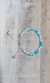 Pulsera celeste y blanca