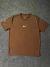 CAMISETA NIKE FORZA - MARROM na internet