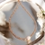 Colar pérola G - Transparente dourado - comprar online
