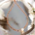 Colar pérola G - Transparente dourado - comprar online