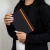 Caderno DR Costura Laranja