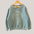 Buzo Optimistic Baby en internet