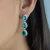 Brinco Festa Três Gotas Pedra Verde Água Cravejados com Zircônias - comprar online