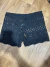 Shorts praia na internet