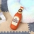 Botella de peluche con válvula chillona - comprar en línea
