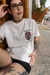 Camiseta Time Bomb (Take back power - off white) na internet