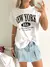 Imagen de Remera jersey ancha sisa al corte New york apenew