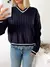 Sweater escote en V linea a contratono Vayots