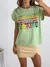 Remera amplia manga rebatible Kindness en internet