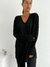 Sweater largo trenzado escote V Briony