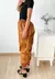 Pantalón cuerina tipo cargo con bolsillos laterales y cintura elastizada Duki - tienda online