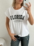 Remera amplia manga rebatible Florida Major City en internet