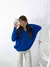 Sweater oversize escote en V y trenzas Silvie