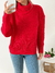 Sweater polera amplio figuras en pecho Werner - comprar online
