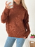 Sweater polera amplio figuras en pecho Werner